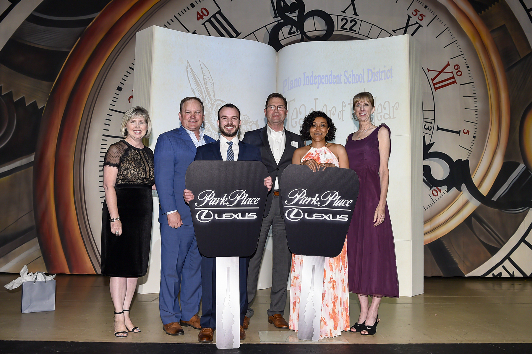 Winners with Board President and Superintendent and Lexus sponsors 